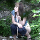 A pretty Eastern-European girl is recorded in voyeuristic fashion as she takes a piss and a tiny, soft shit in a wooded, outdoor location. Poop action is visible beneath her, but it is not a lot. She does not wipe when finished. 720P HD. Over 2 minutes.